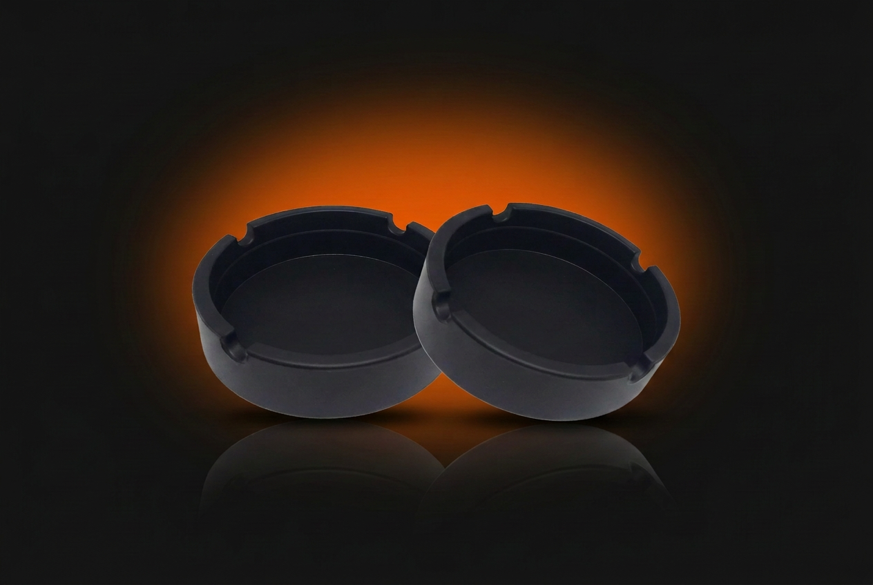 Premium ashtrays photographed on a dark premium retail background